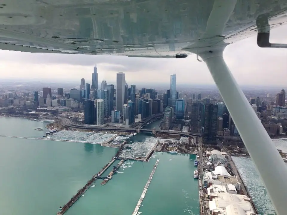 Aircraft underview with city canal
