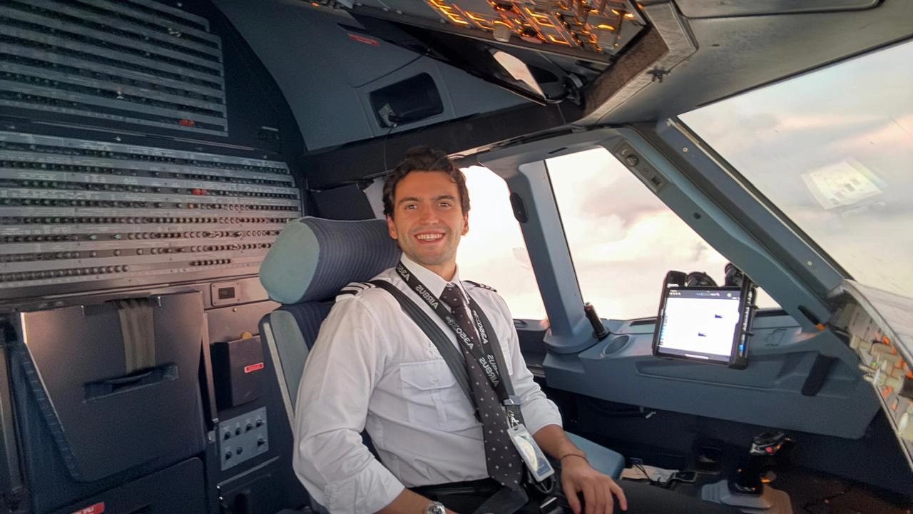 Pilot in commercial aircraft cockpit